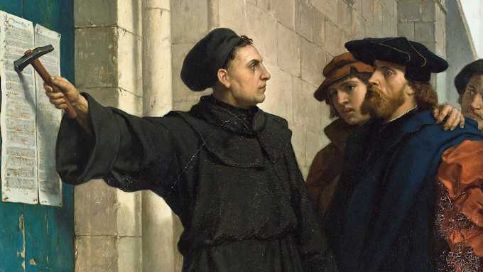 Lutero illustra le sue 95 tesi